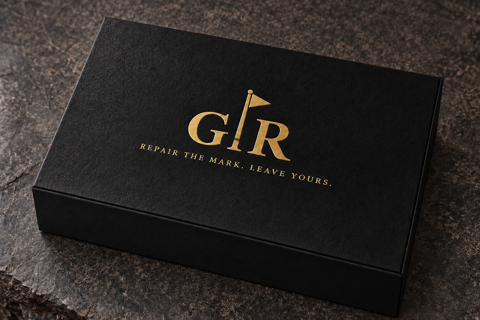 Closed matte black GIR presentation box with gold logo and Repair the mark. Leave yours. slogan on the exterior lid
